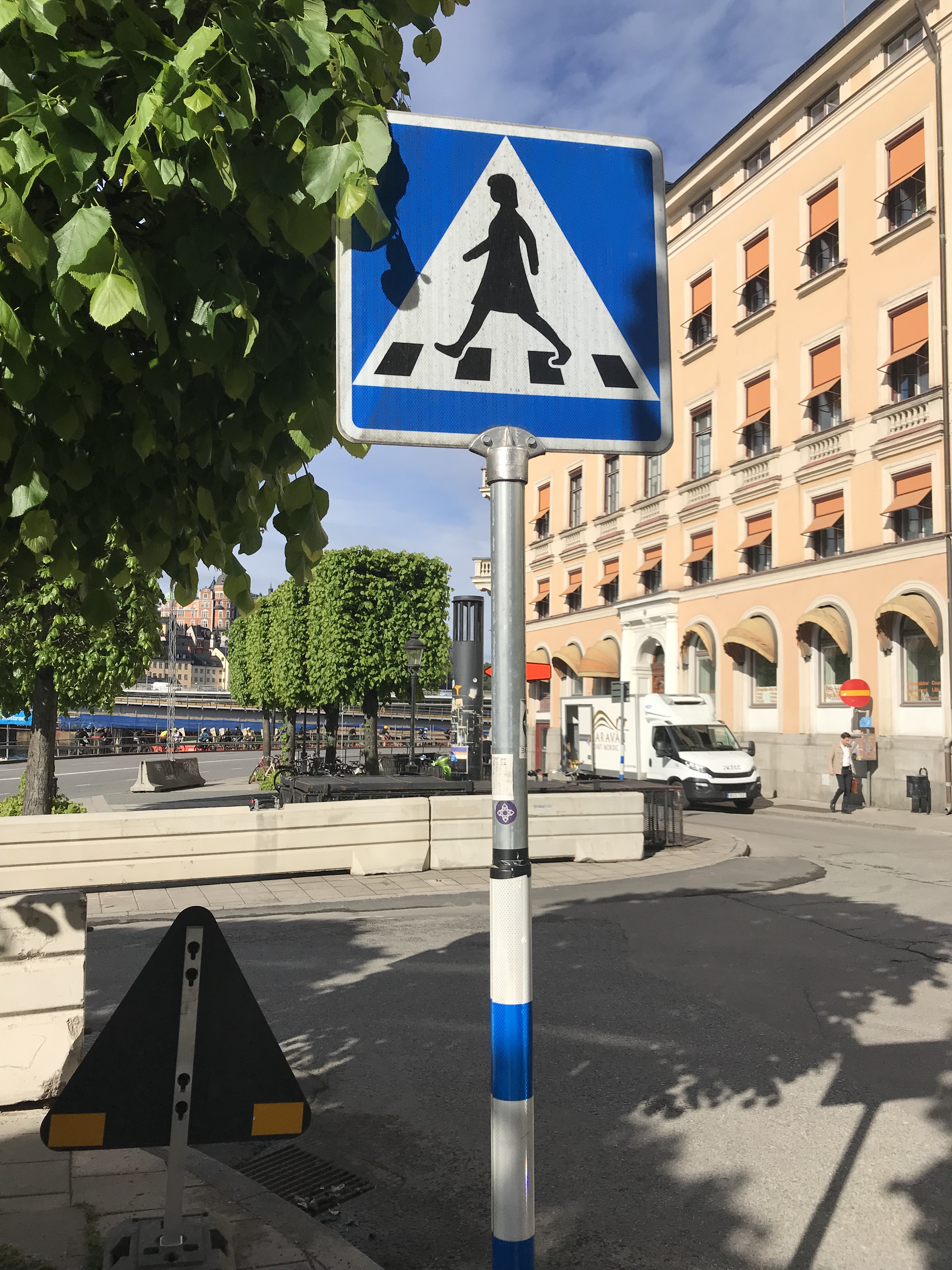 Lady at the Stockholm, Sweden crosswalks (pedestrian crossings)