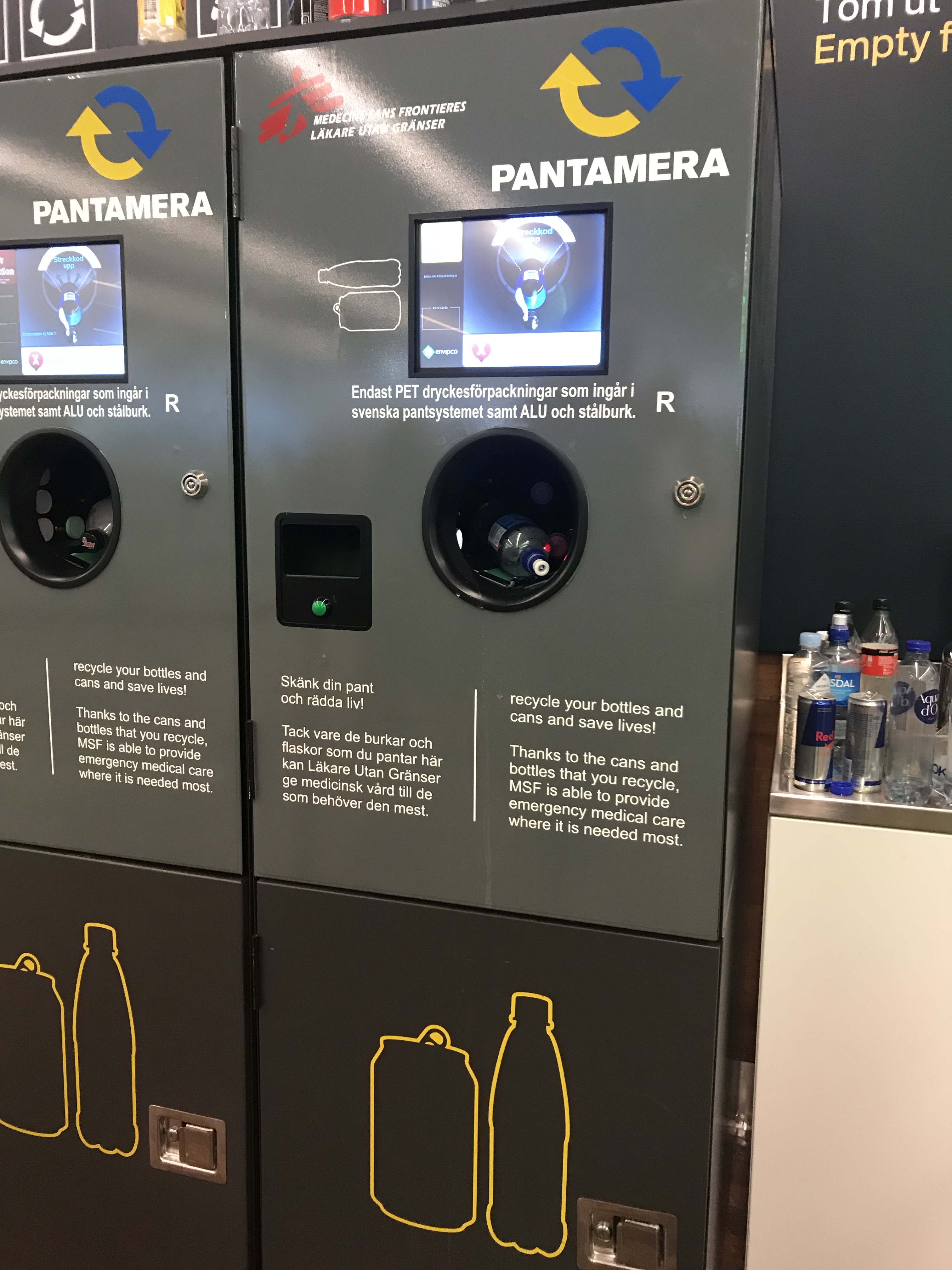 Recycling your bottles and cans at a Pantamera machine in Gothenburg Landvetta Airport, Sweden